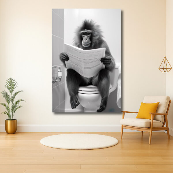 Aap leest krant op toilet