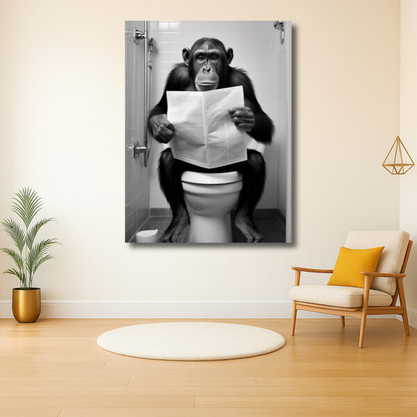Aap leest krant op het toilet